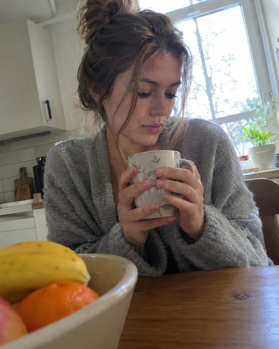 Woman having a calm morning coffee moment