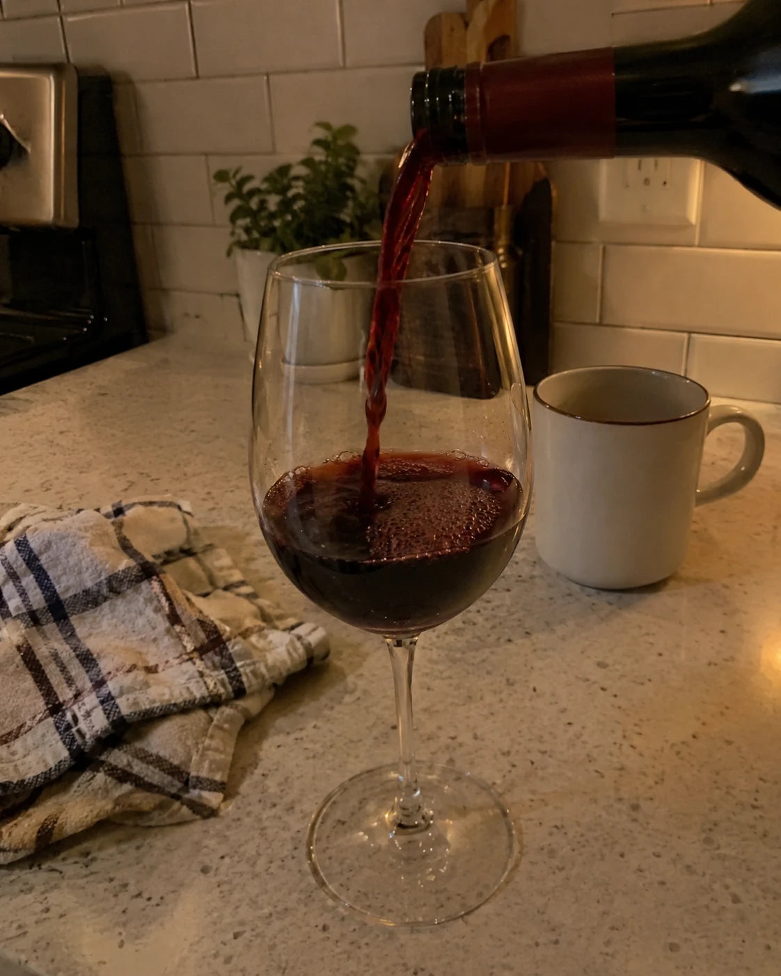 Wine being poured again into a glass later in the evening