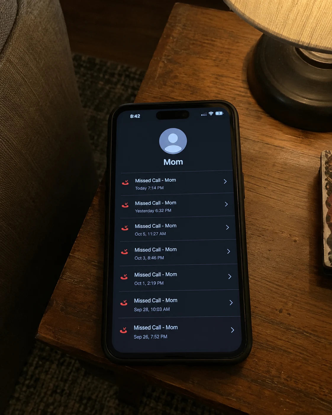Phone showing missed calls from Mom