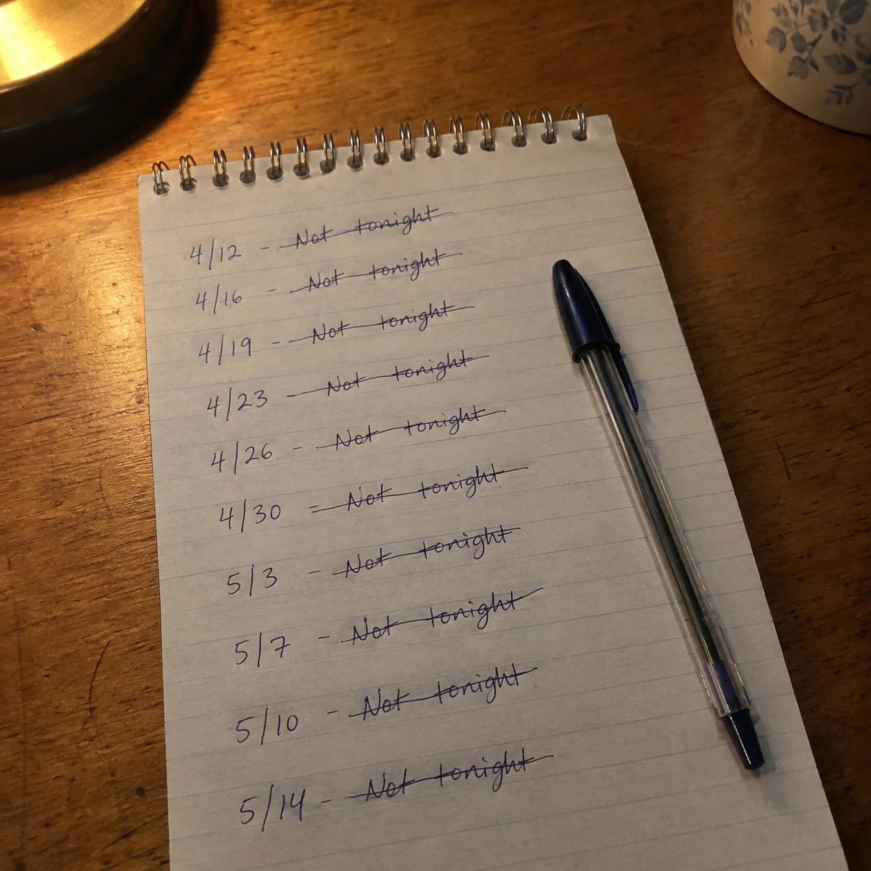 Notepad page with dates and 'not tonight' crossed out